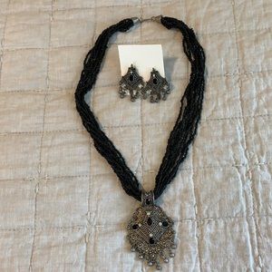 Beaded necklace/earrings with silver tone brooch